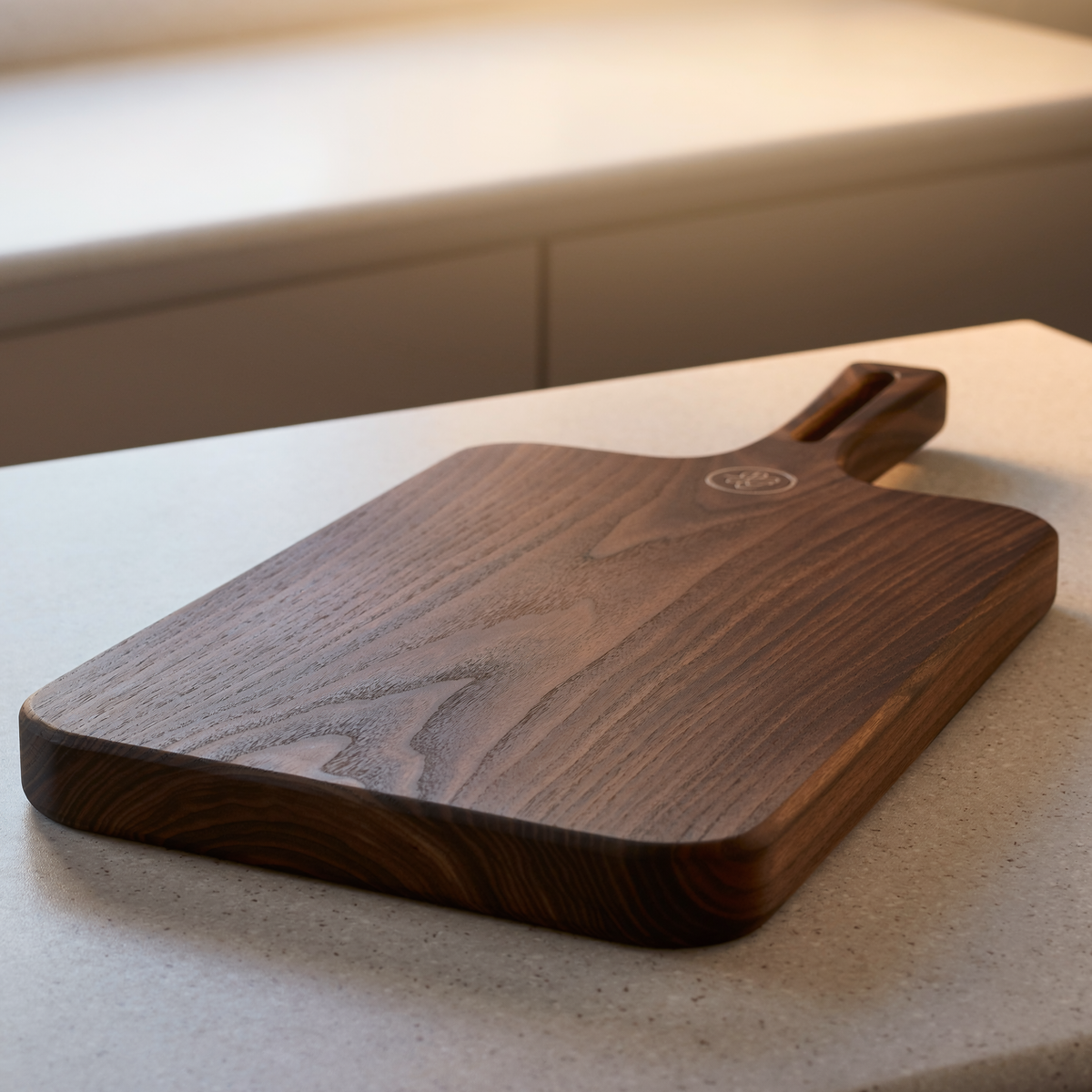 Dark walnut charcuterie serving board angled view showing hardwood thickness and rounded edges