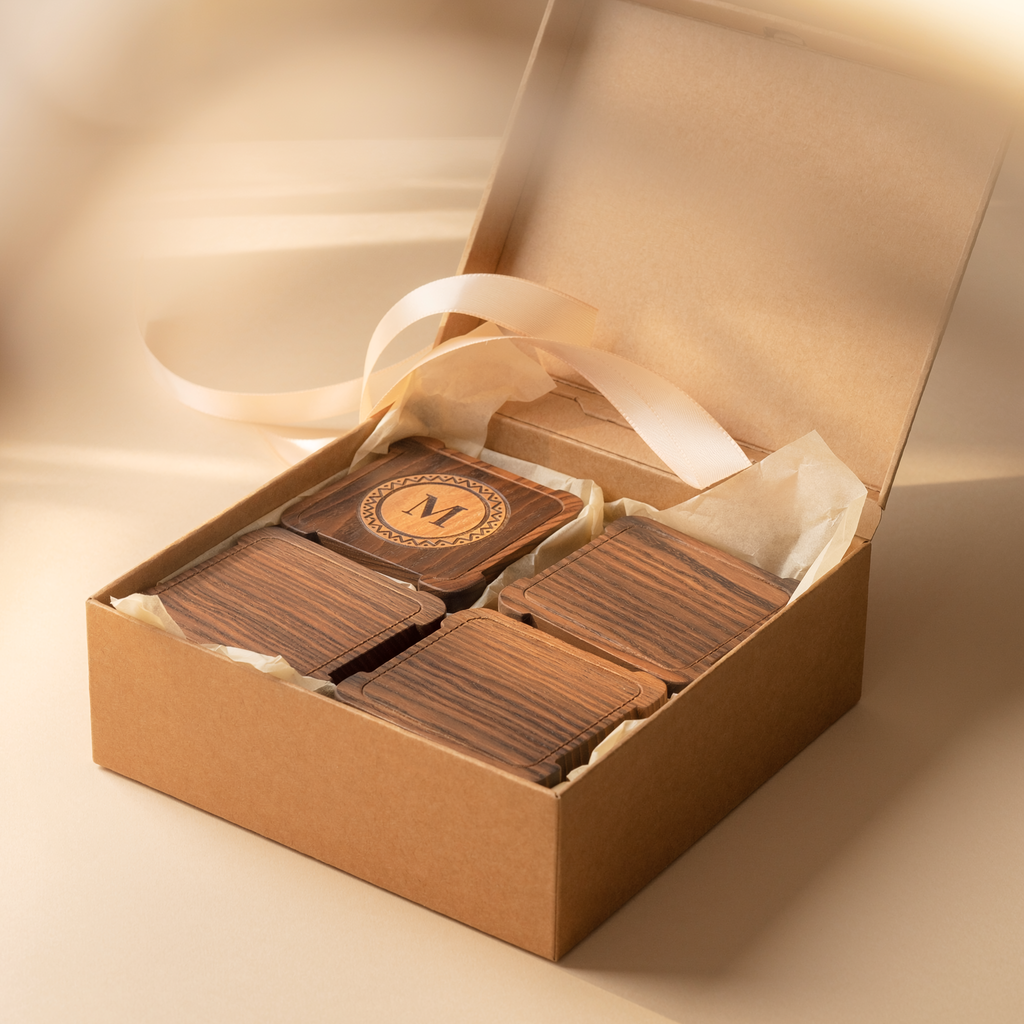 Matching square dark walnut monogram coaster set in fitted premium gift packaging