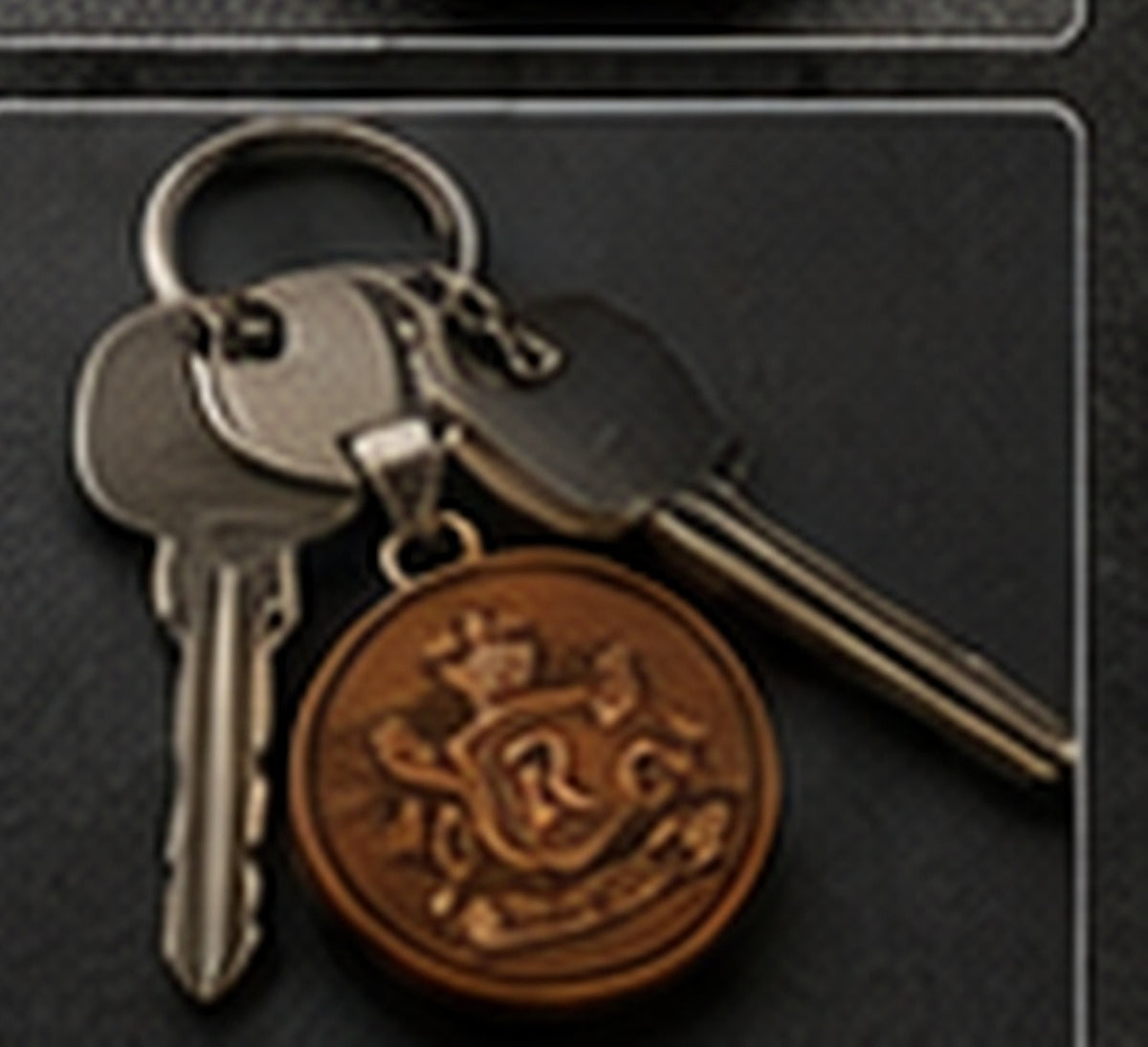 Personalized family crest keychain shown with keys for everyday size and scale