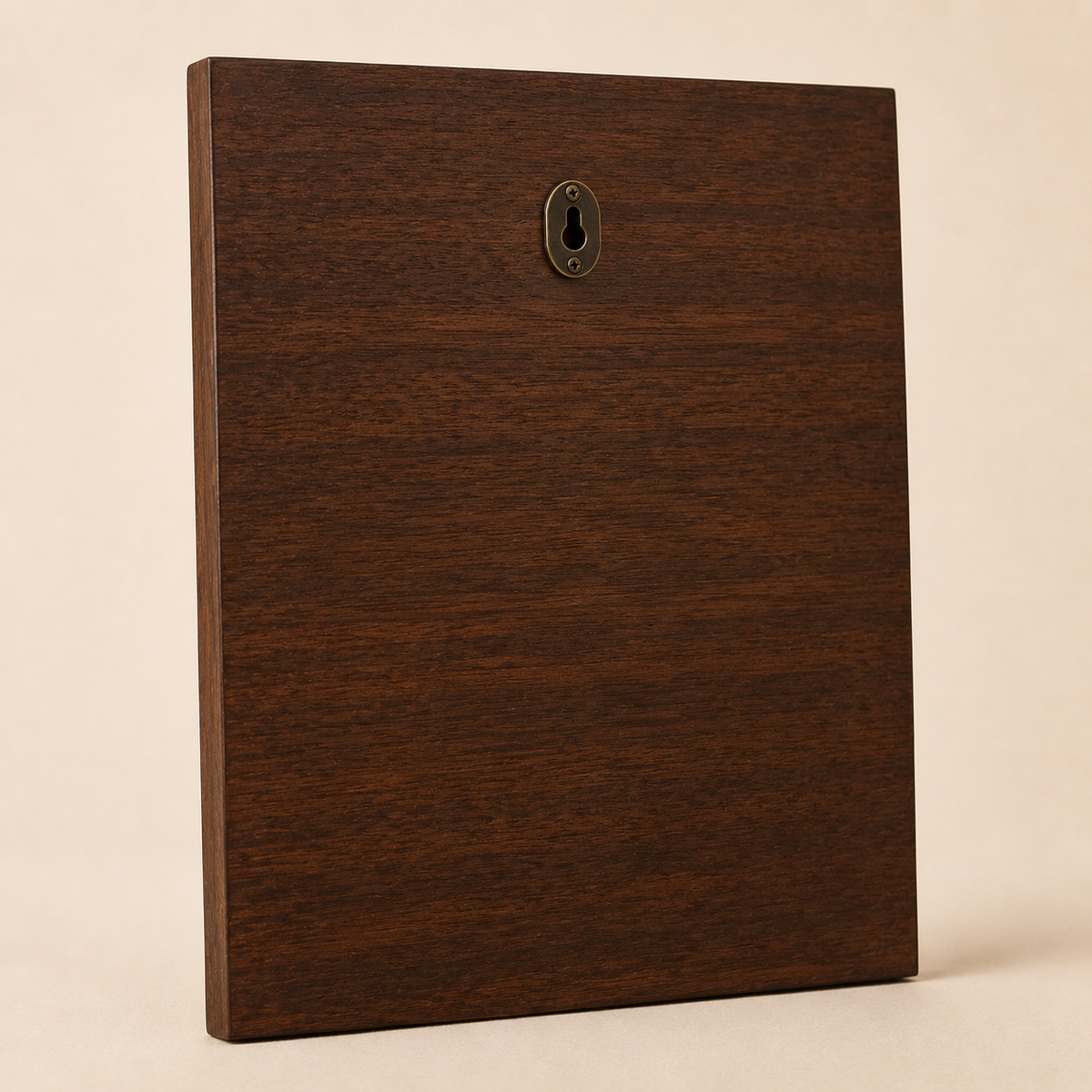 Rear view of dark walnut pet memorial plaque showing finished wood back and keyhole hanging hardware